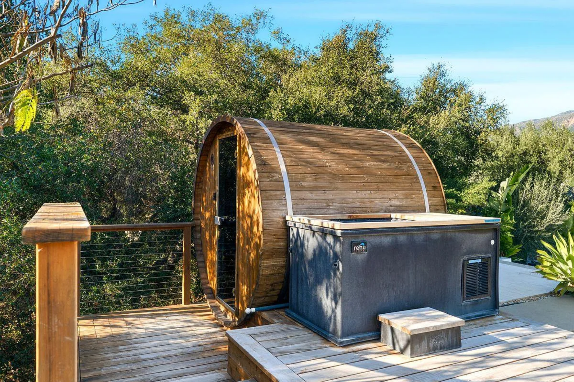Tucked into a private deck, the cedar sauna and cold plunge setup offers a dedicated wellness zone.