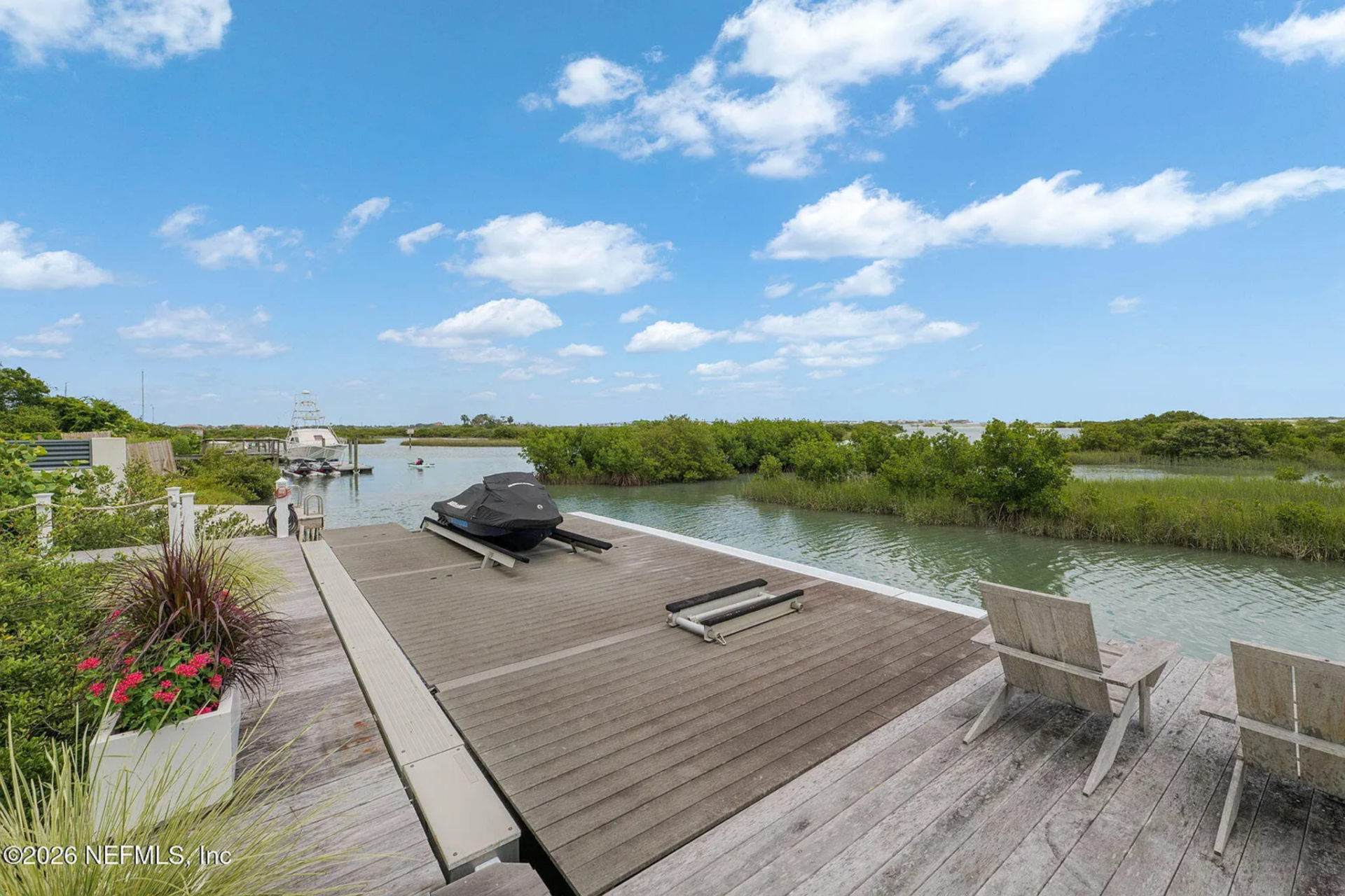 Lastly, the dock stretches into the calm waterway and is built with concrete pilings and a vinyl bulkhead for durability.