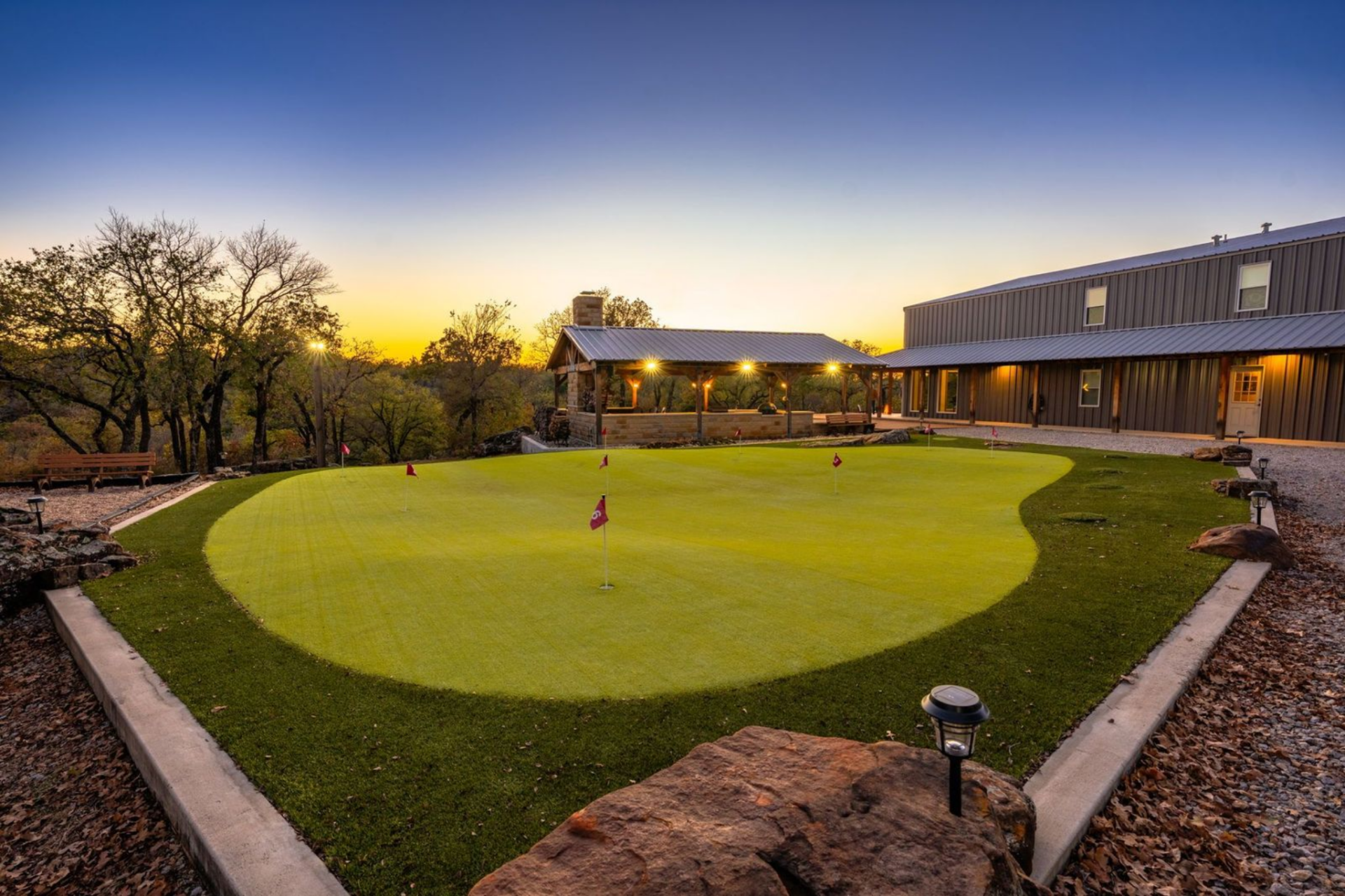 Just off the house, a private putting and chipping green offers a dedicated space to work on your short game while taking in sweeping Hill Country views at sunset.