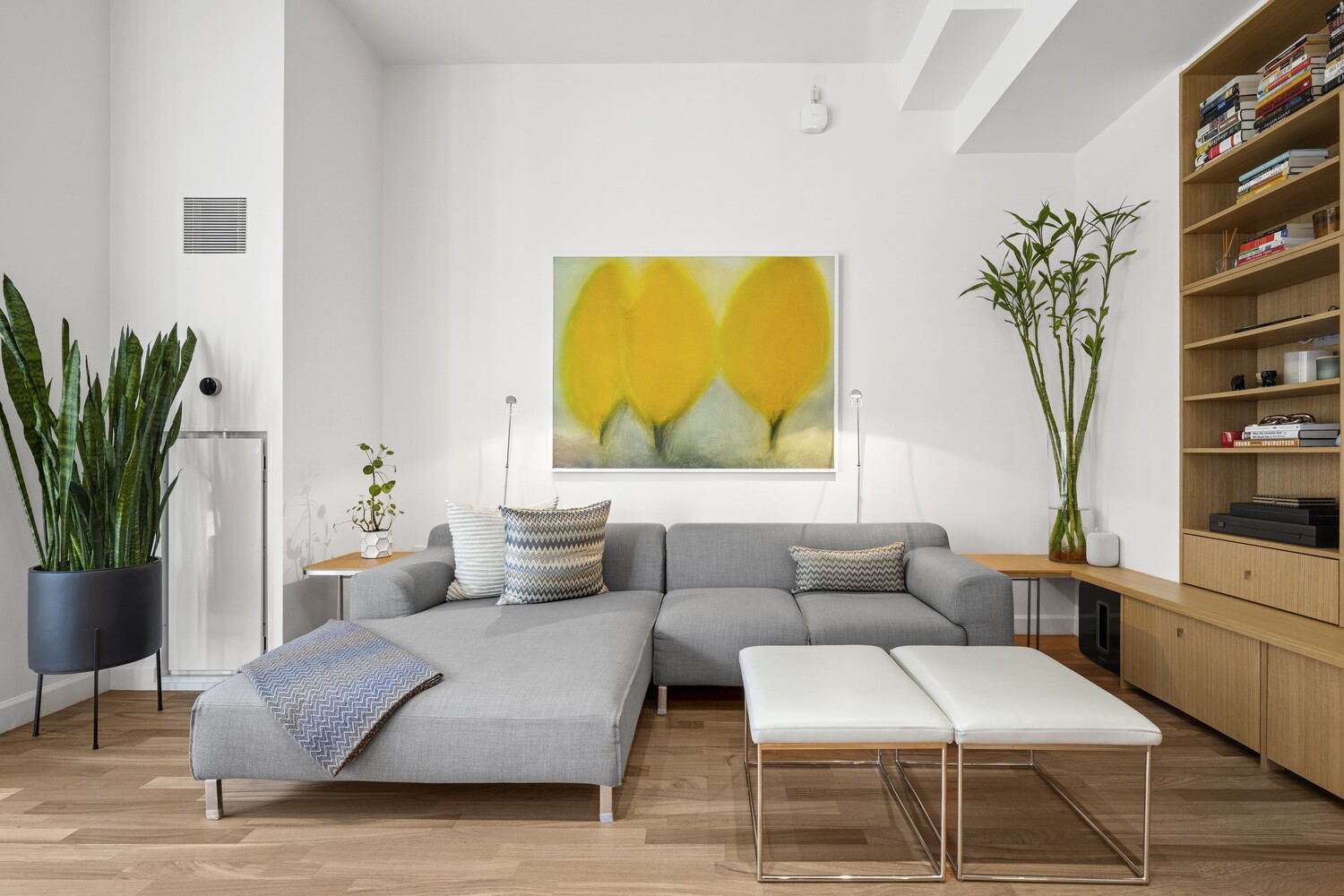 The family room has low seating arranged to face both the view and the workspace.