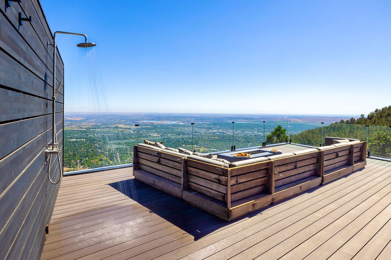 The rooftop deck delivers expansive, unobstructed views that stretch from the Flatirons to the Continental Divide. 
