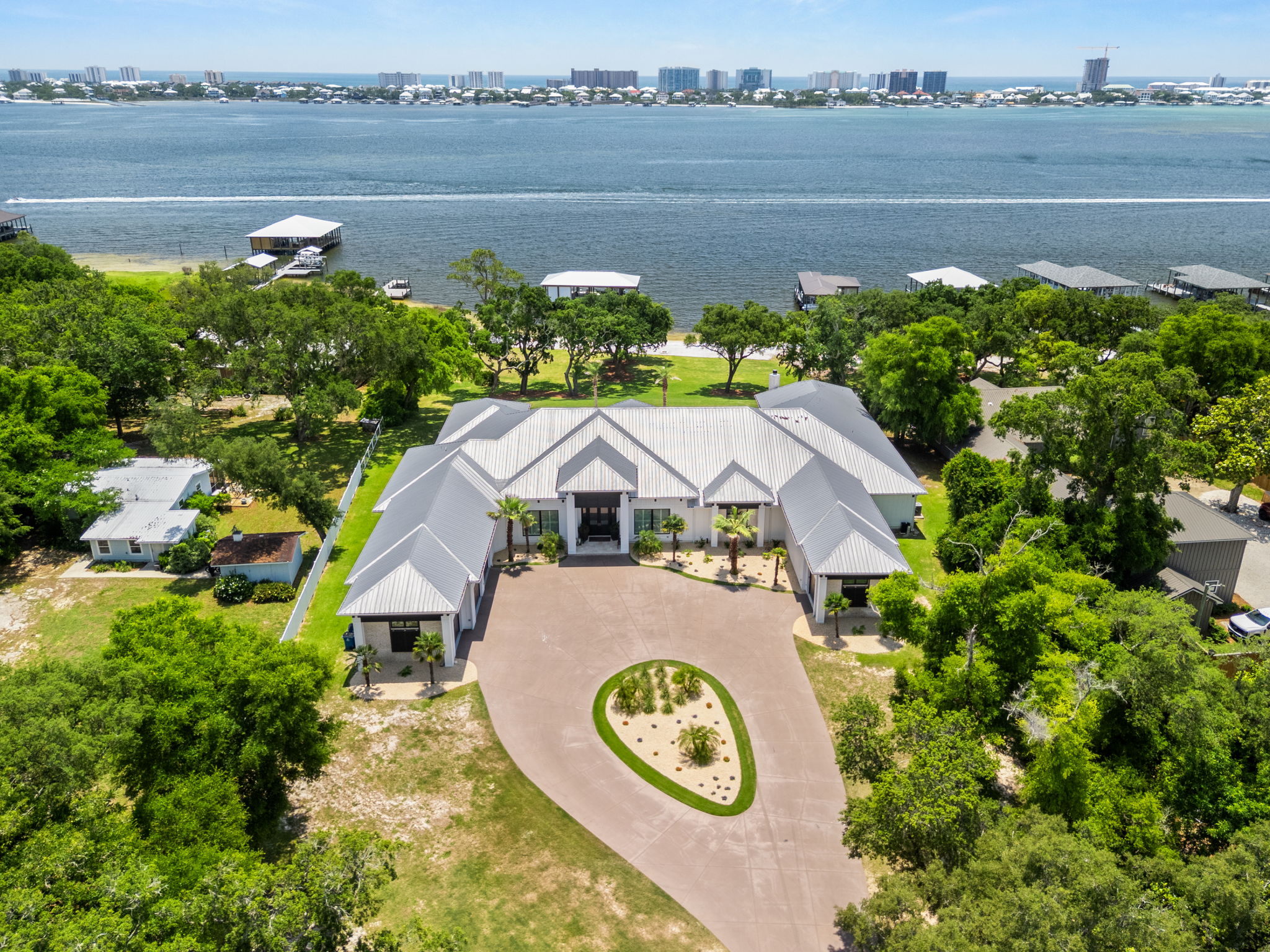 Front exterior of Matt Bryant's former Alabama house in the water.