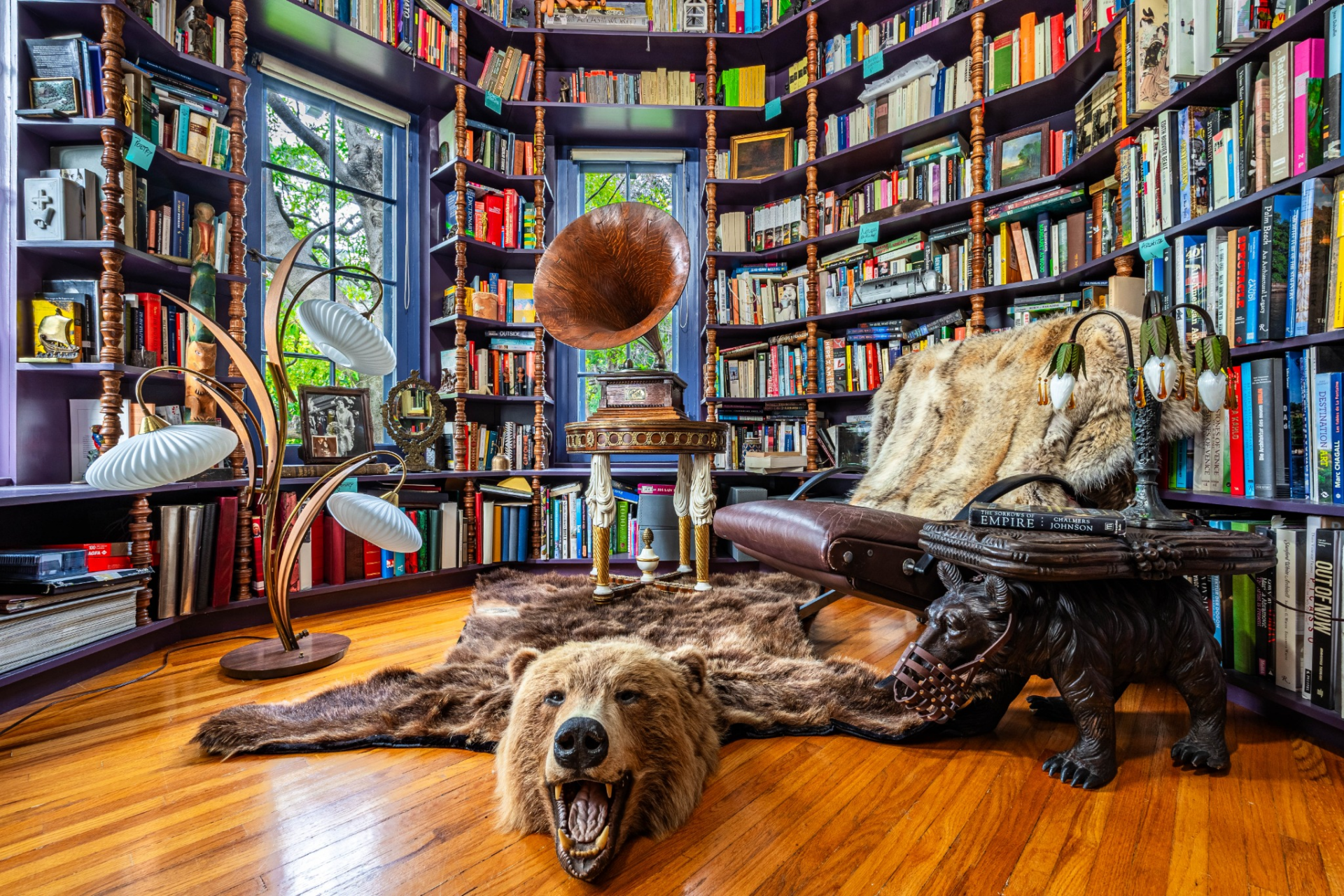 One of the home’s most distinctive spaces is the octagon-shaped library, where floor-to-ceiling bookshelves wrap around the entire room.