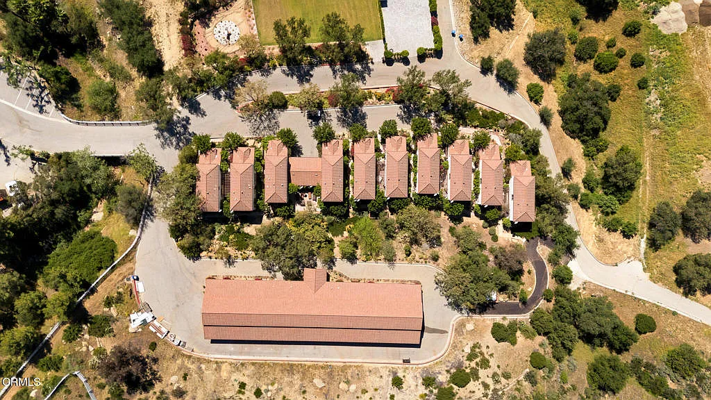 Aerial view of a row of 10 row of 3-bedroom townhouses.