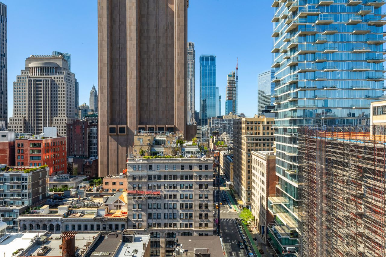 Distant shot of Mariah Carey's Tribeca Penthouse building in the middle of New York City.