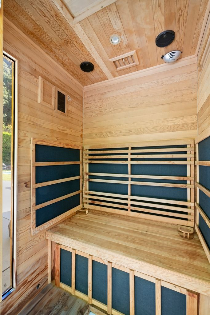 Lastly, tucked around the corner of the house is a dedicated sauna finished almost entirely in natural wood.