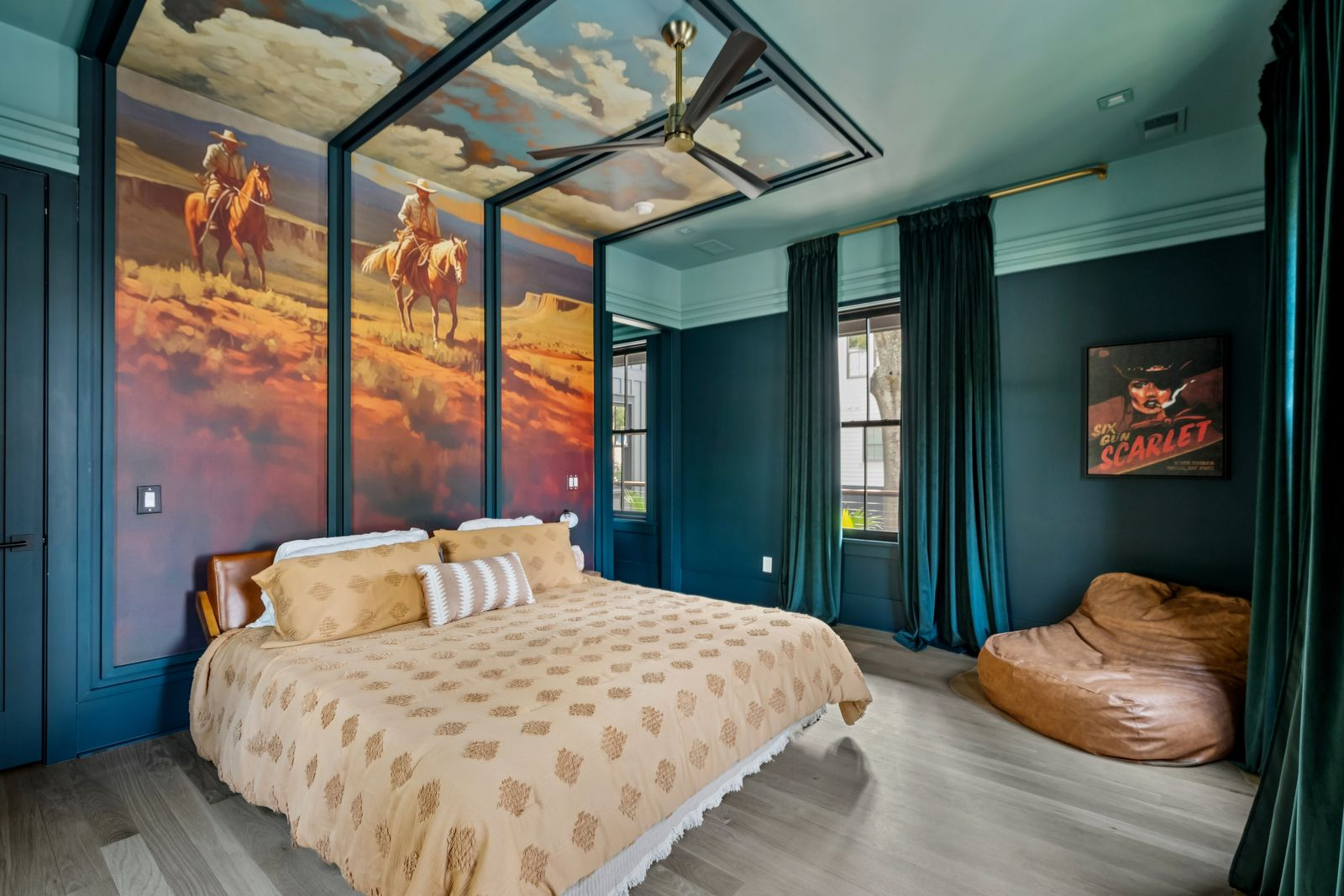 Taking on a completely different personality from the rest of the home with a cinematic Western-inspired design is the secondary suite. 