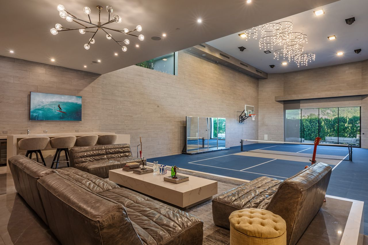 Switch between basketball and pickleball on this versatile court, spacious enough for a doubles match or a pickup game, all illuminated by overhead LED lighting for day-to-night play.