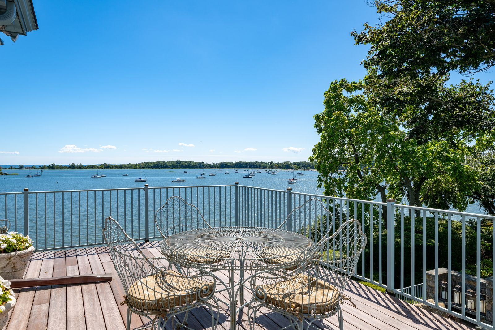 Extending directly off the suite, the private porch functions as a secluded outdoor sitting area suspended above the water. 