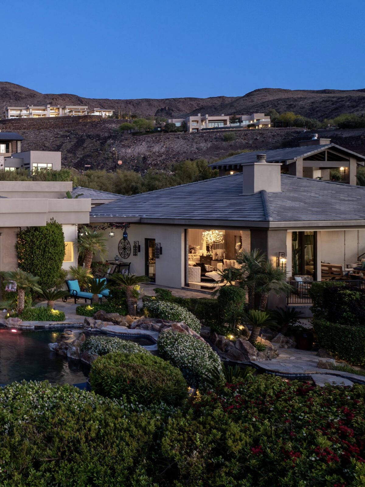 Hillside home with a lagoon style pool.