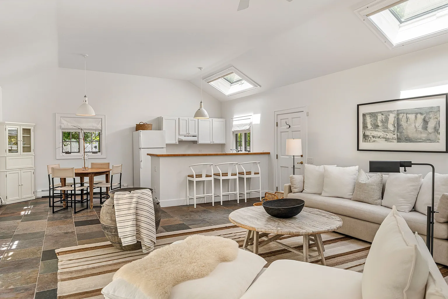 A compact kitchen and dining area provide everyday convenience.