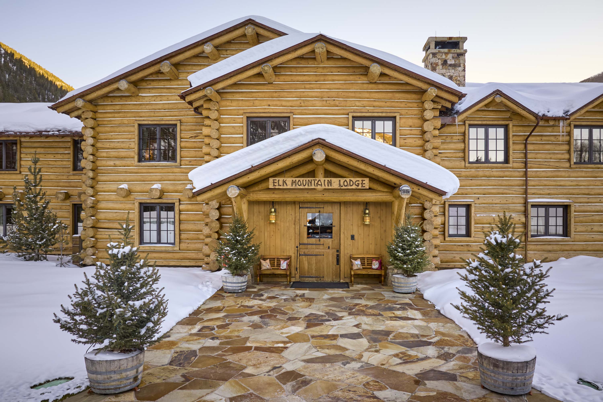 The home blends a frontier-inspired aesthetic with modern systems and sustainable design elements.
