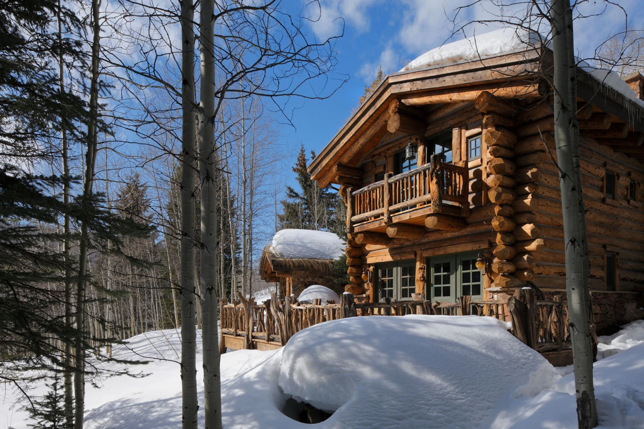 Log cabin in the snow.