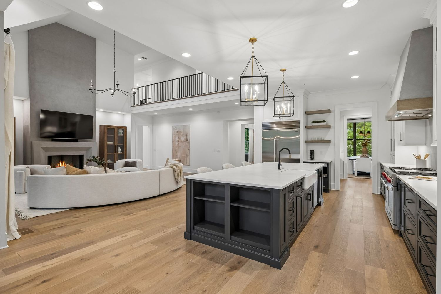 The home transitions into a spacious kitchen and casual dining.