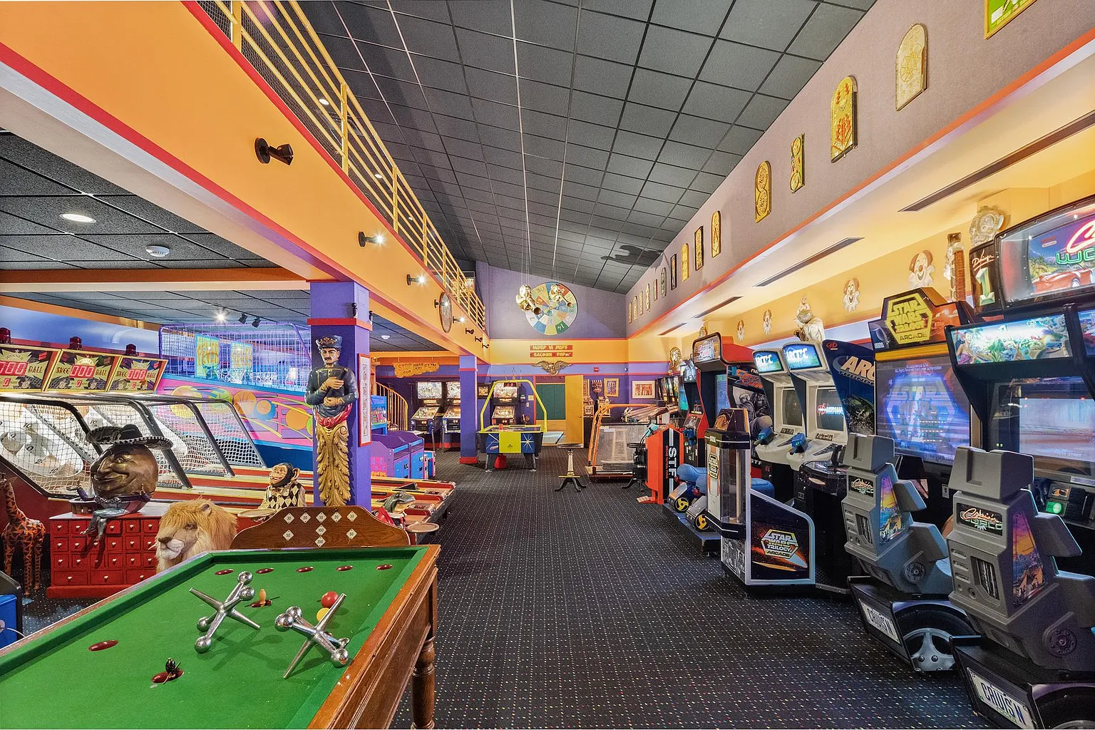 Around the corner there's also a massive arcade filled with classic video games, skee-ball, air hockey, racing simulators, and other attractions.