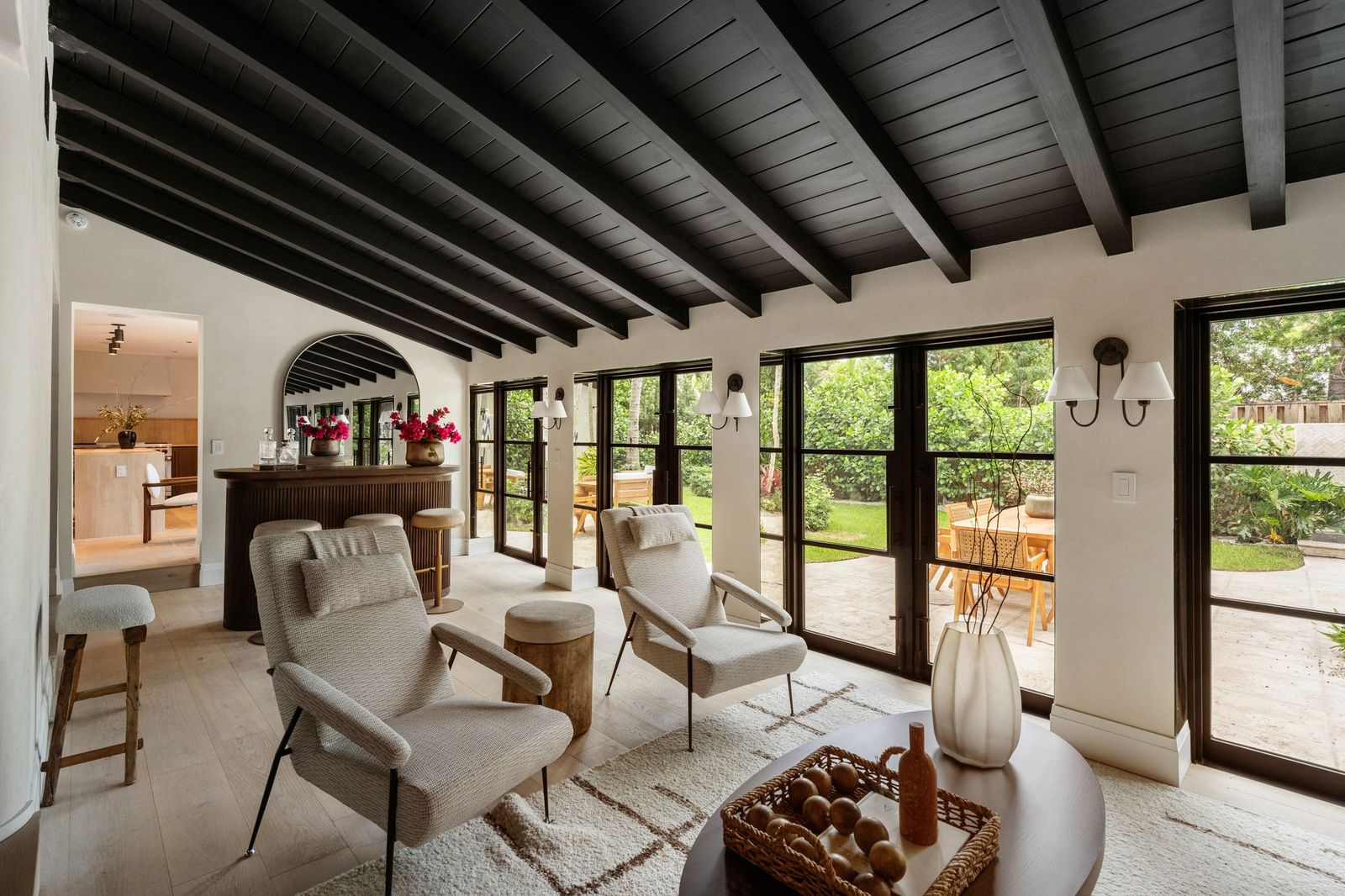 A dedicated bar lounge that serves as the central link between each of the primary entertaining spaces. 