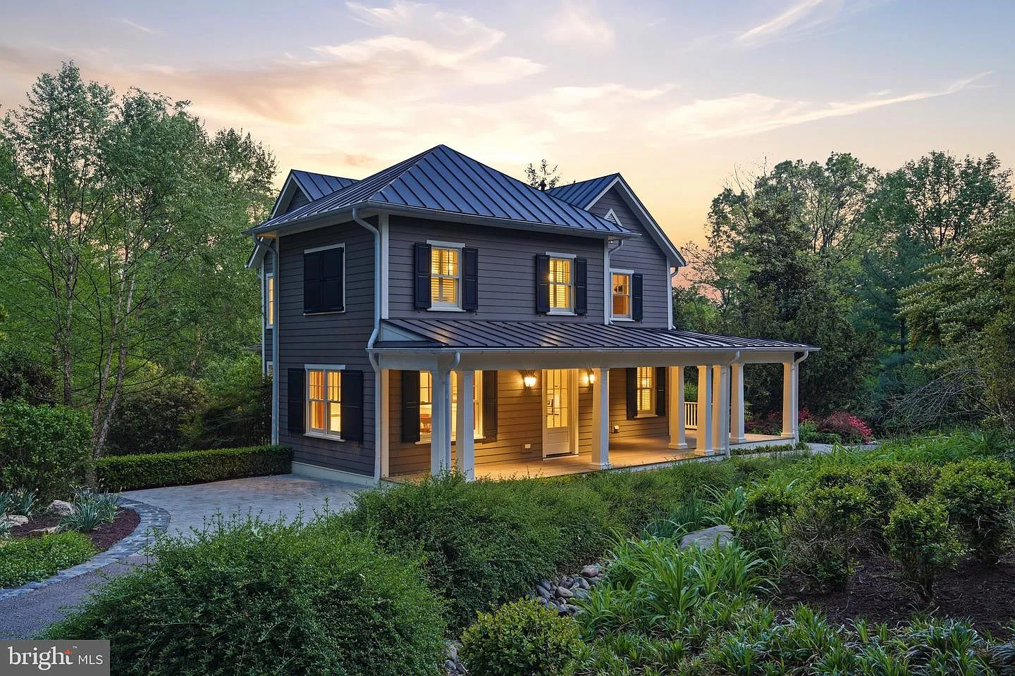 Tucked away from the main residence is a separate 2,600 square foot guest house. 