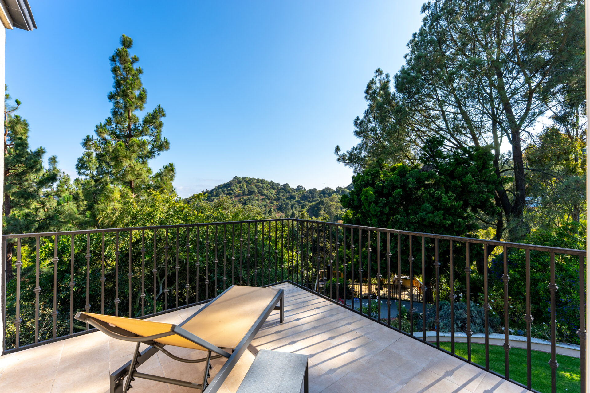A private balcony overlooking the surrounding canyon landscape.