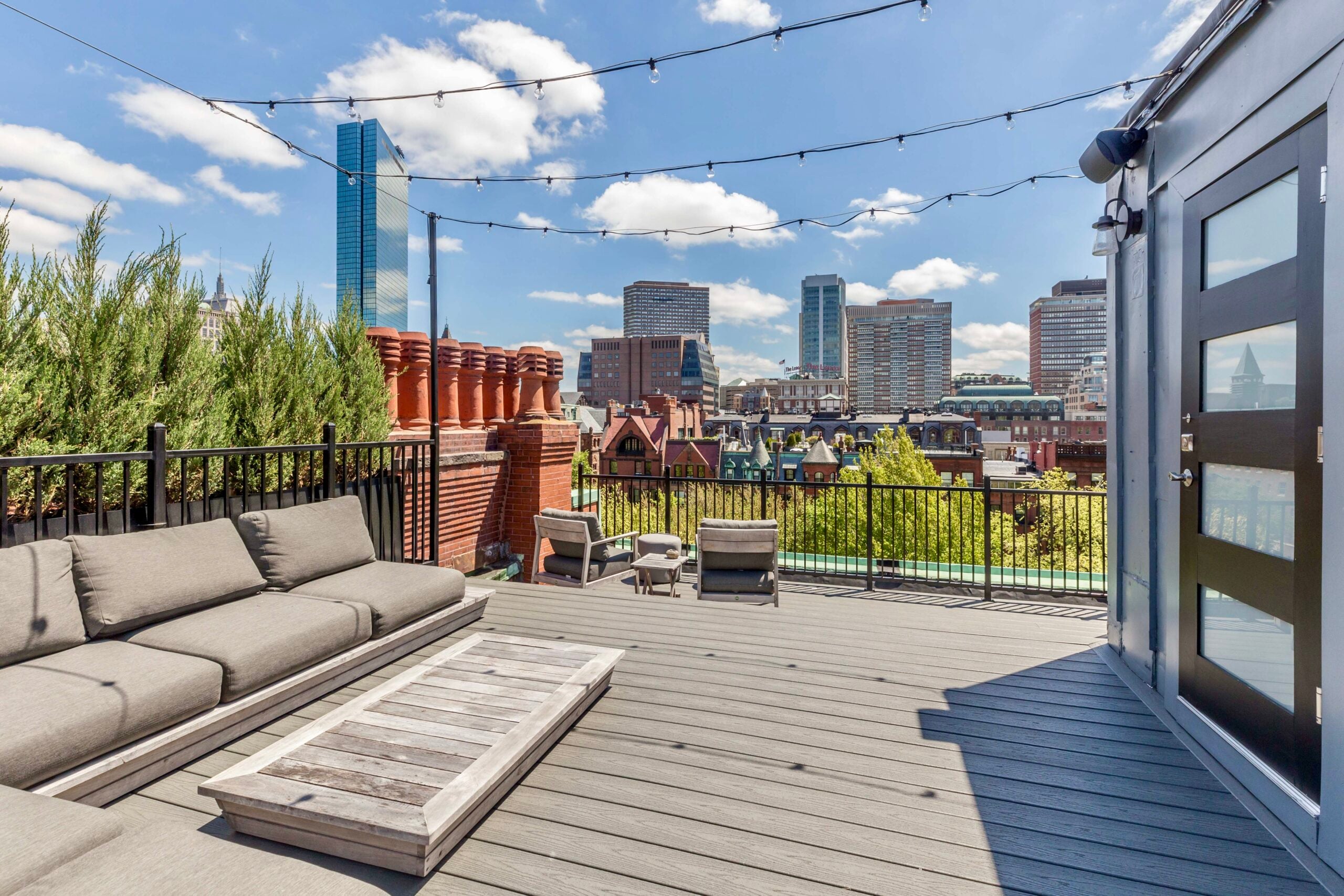 Rooftop deck looking out over Boston.