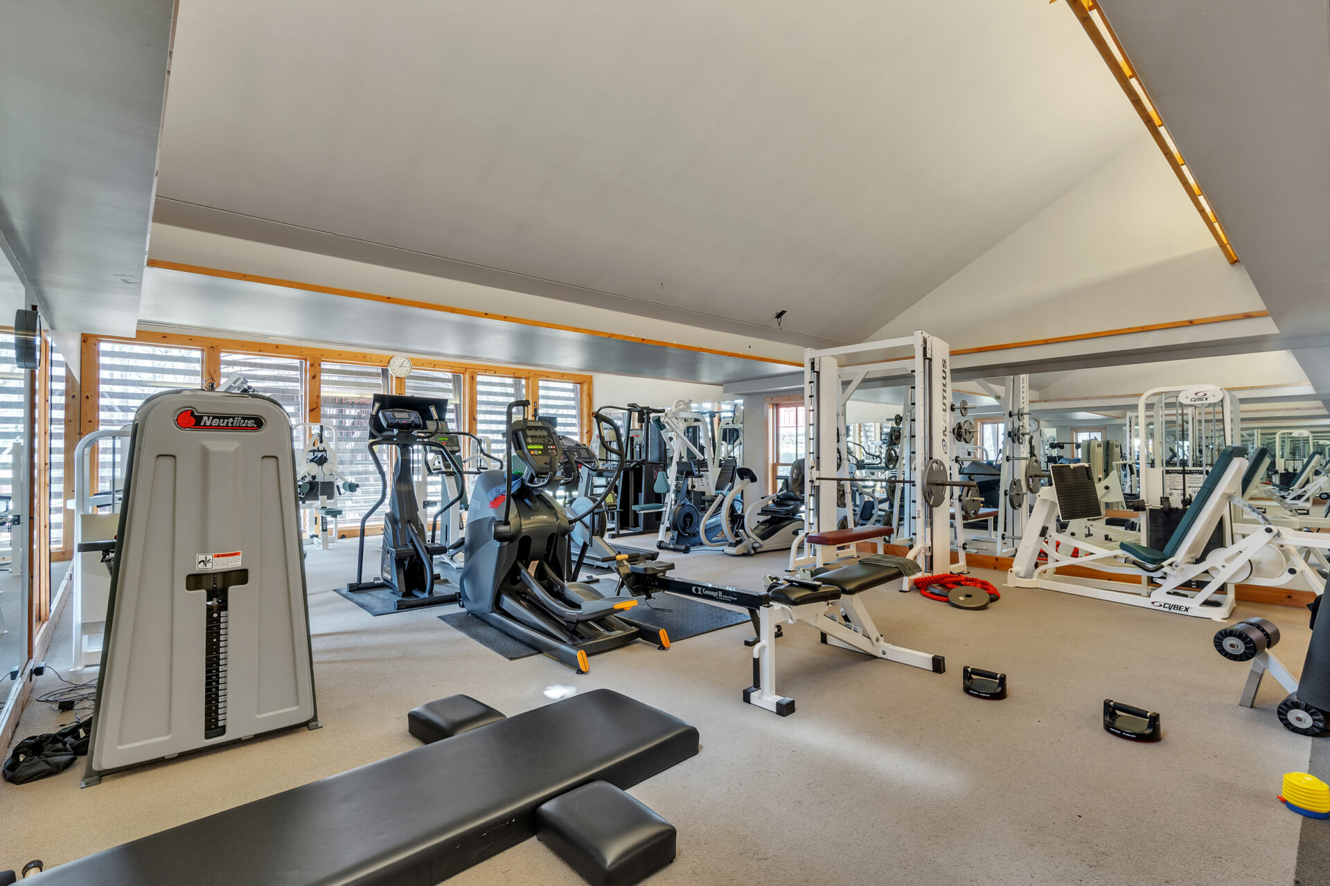 For a more classic type of exercise, a fully equipped fitness center offers an extensive selection of strength-training and cardio equipment set against walls of mirrors and windows.