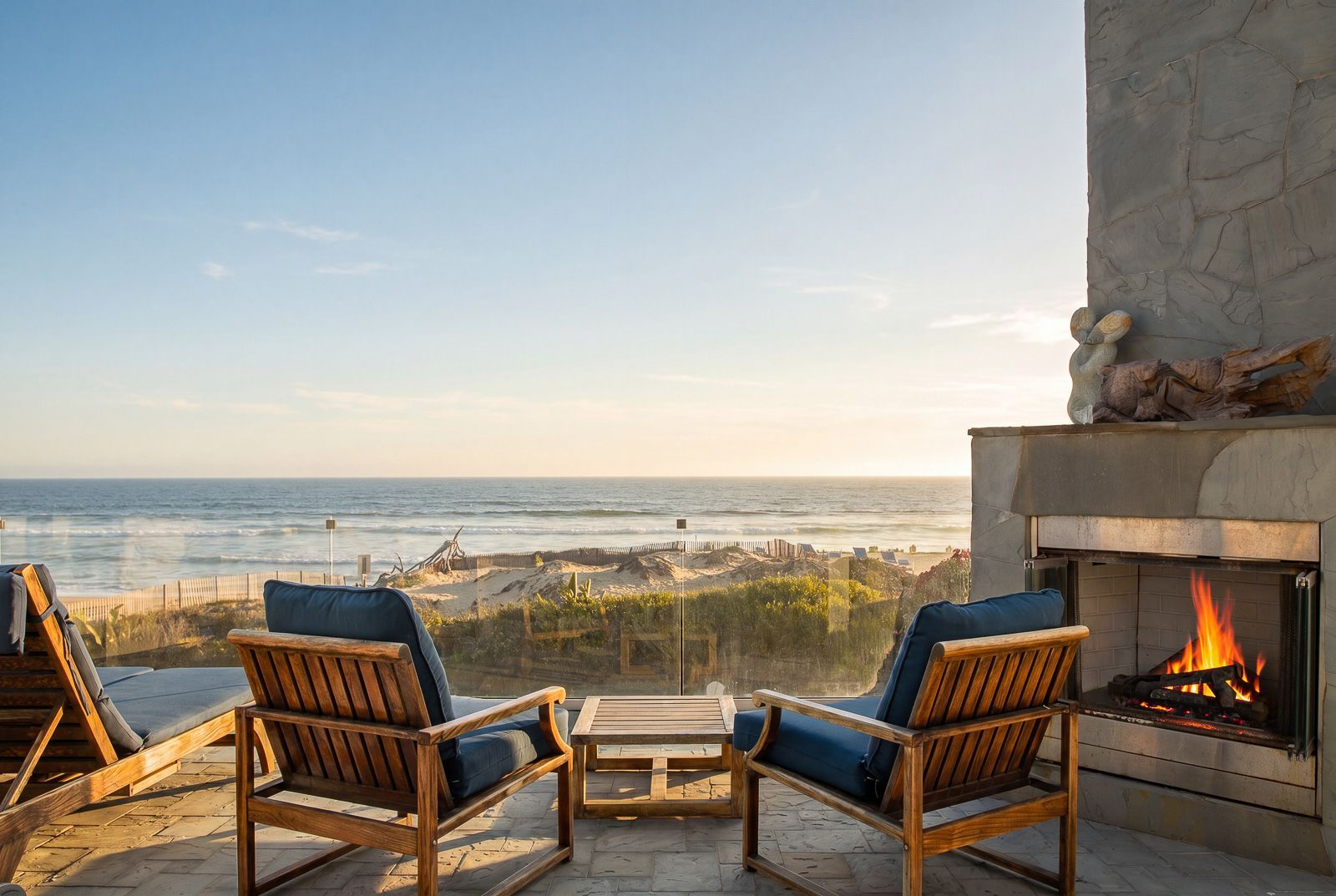 The terrace offers a secluded sitting area with its own outdoor fireplace.