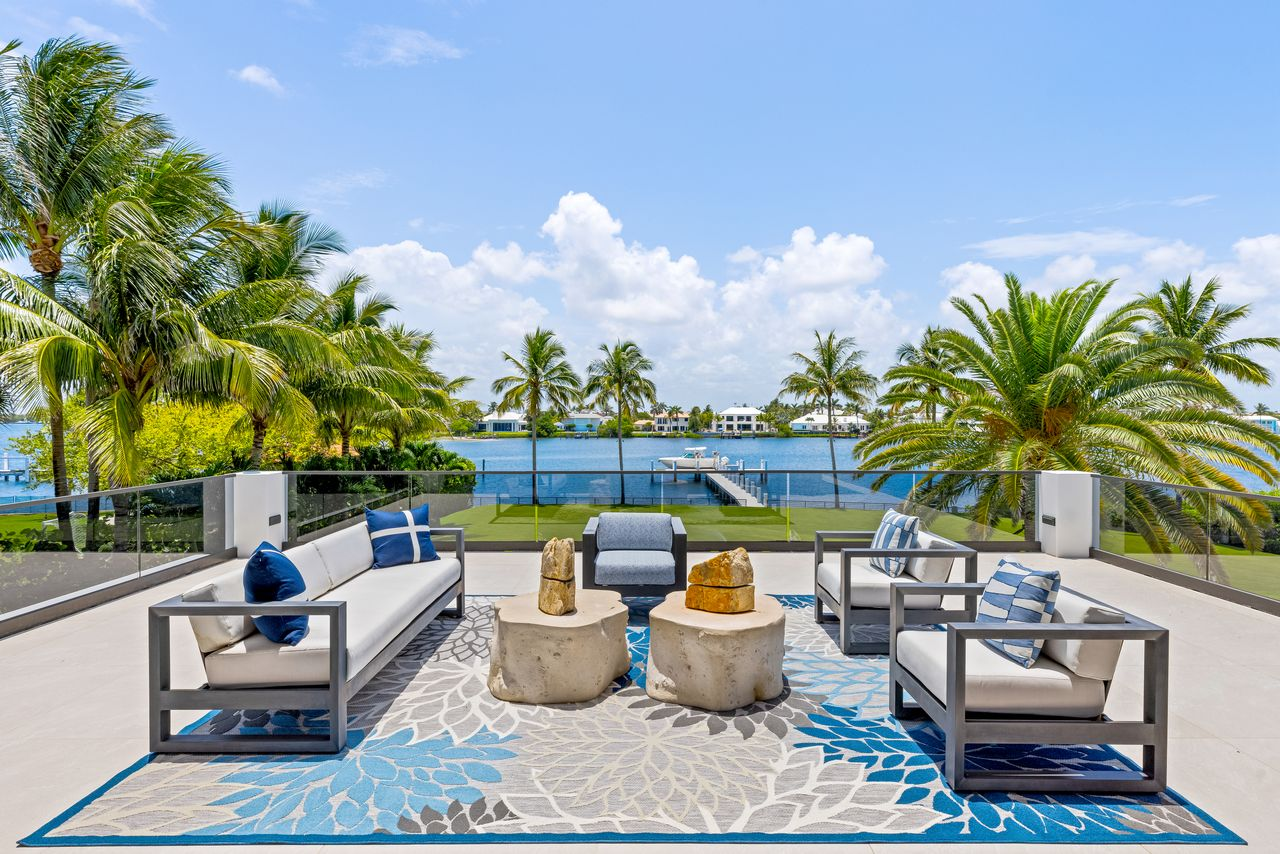 A comfortable outdoor living room positioned to take full advantage of the Intracoastal water views.