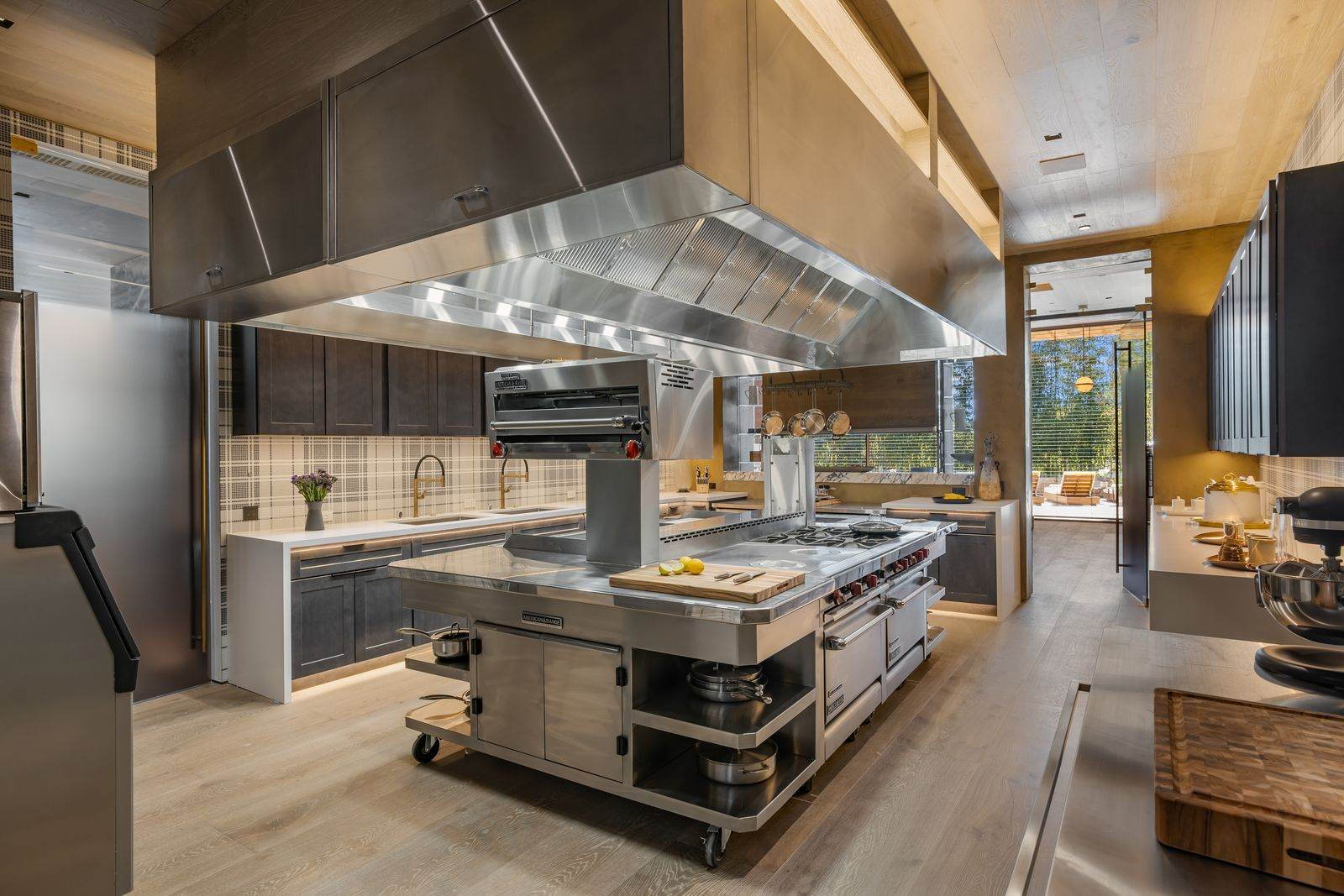 The prep kitchen has a much more utilitarian layout designed around commercial-grade equipment.
