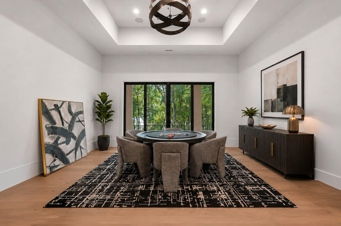 The poker room is arranged around a circular gaming table with seating for eight, positioned over a black patterned rug.