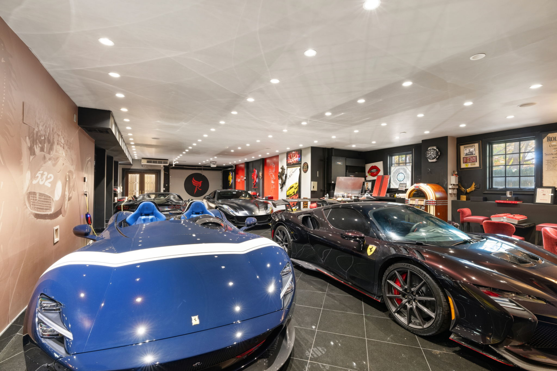 A large garage designed to accommodate a large car collection.