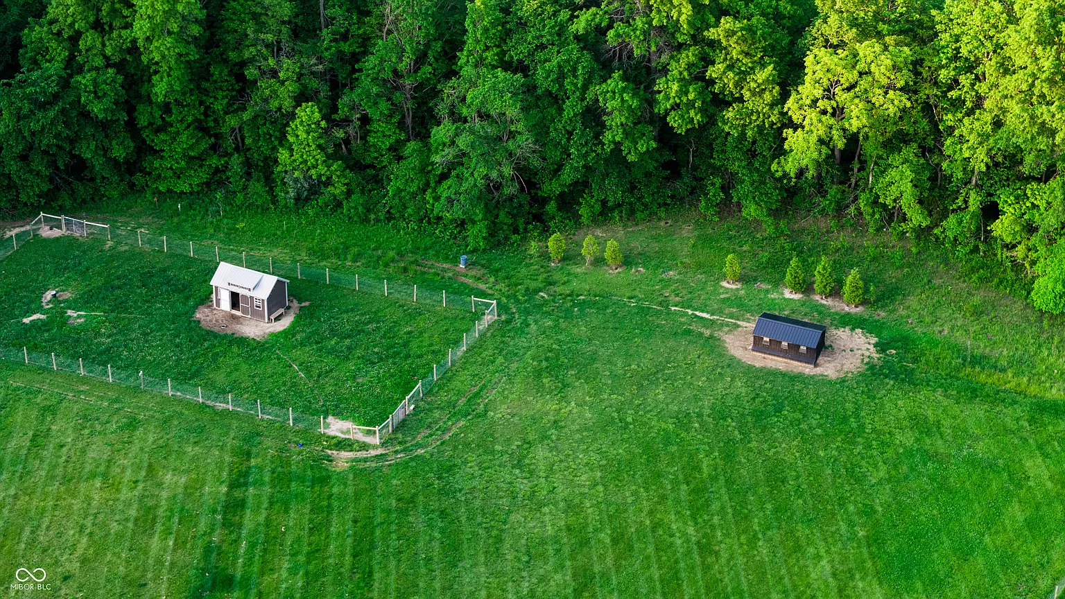 The first stretch of the property is organized around fenced grazing areas, with nearly 19 acres devoted to pasture and hay ground. 