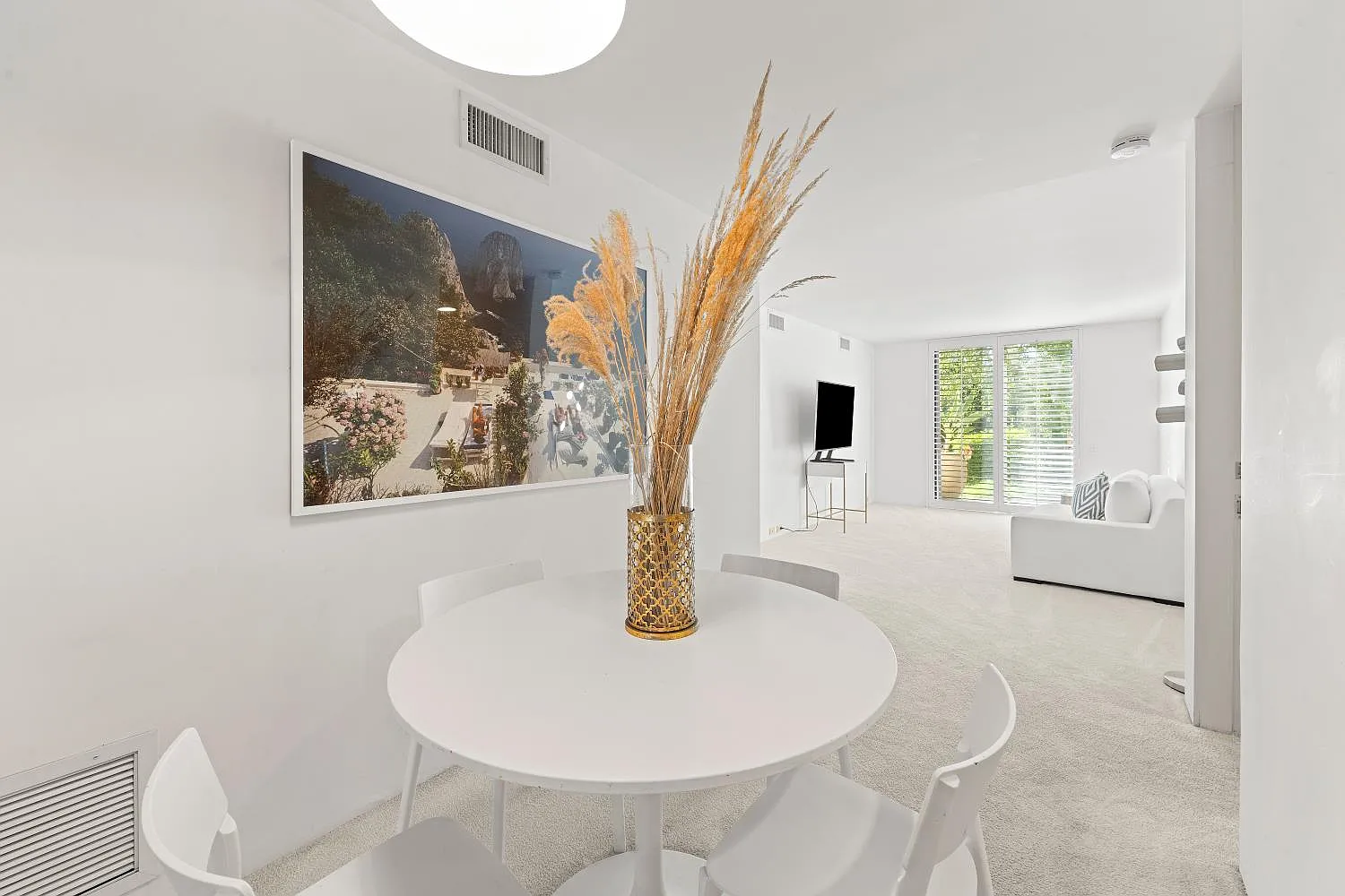 Small dining and living area in a private apartment.
