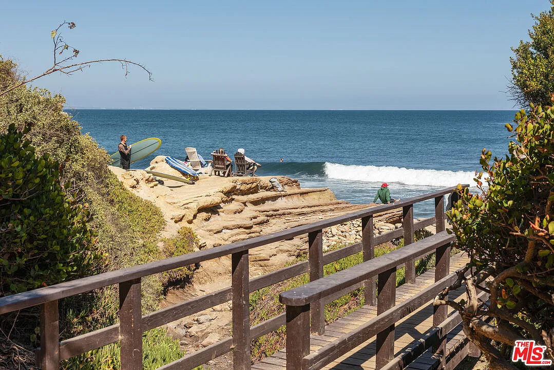 Access down to the water via a private coastal path.