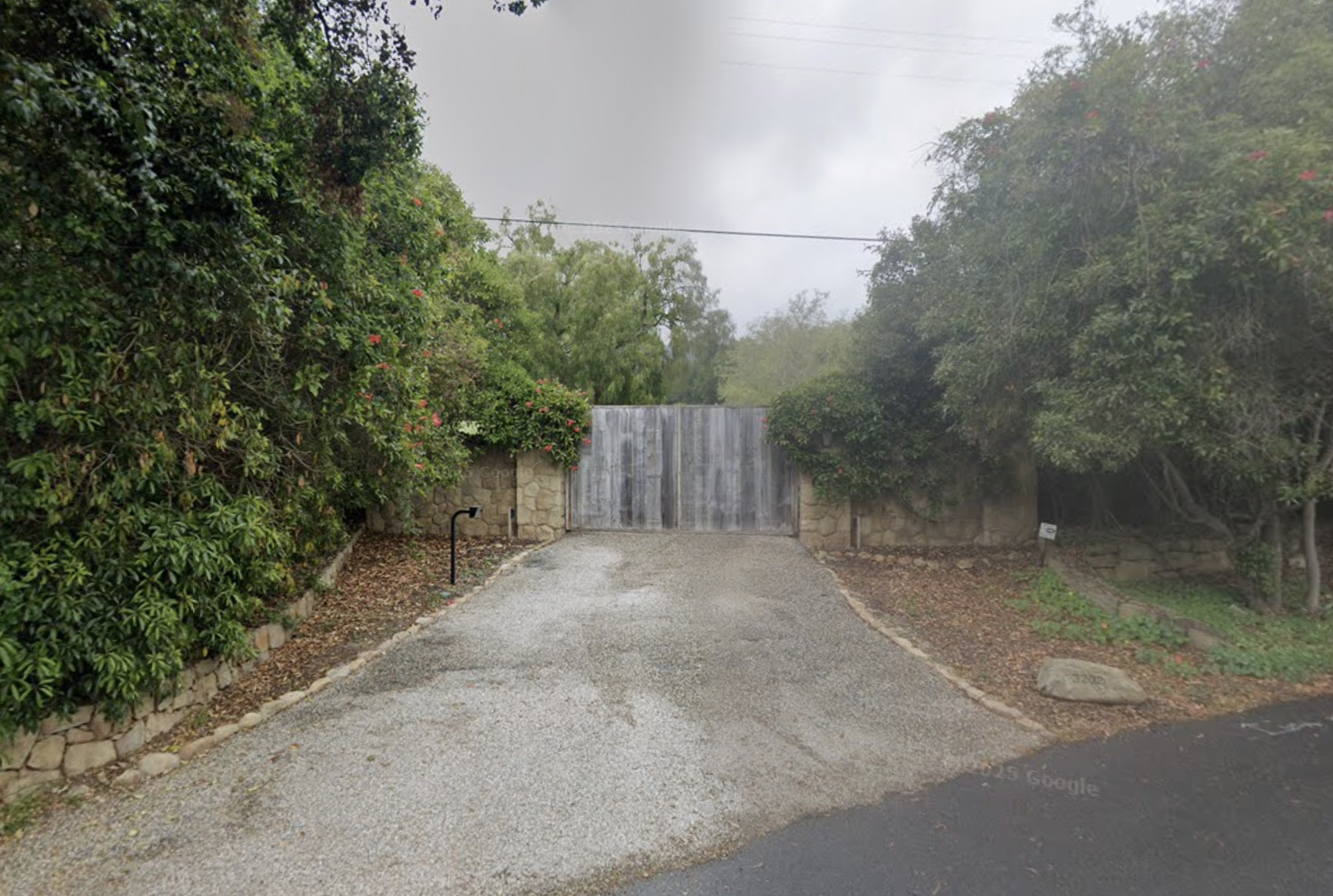 Gated side entrance to Ellen DeGeneres and Portia de Rossi's Former Santa Barbara Farmhouse.