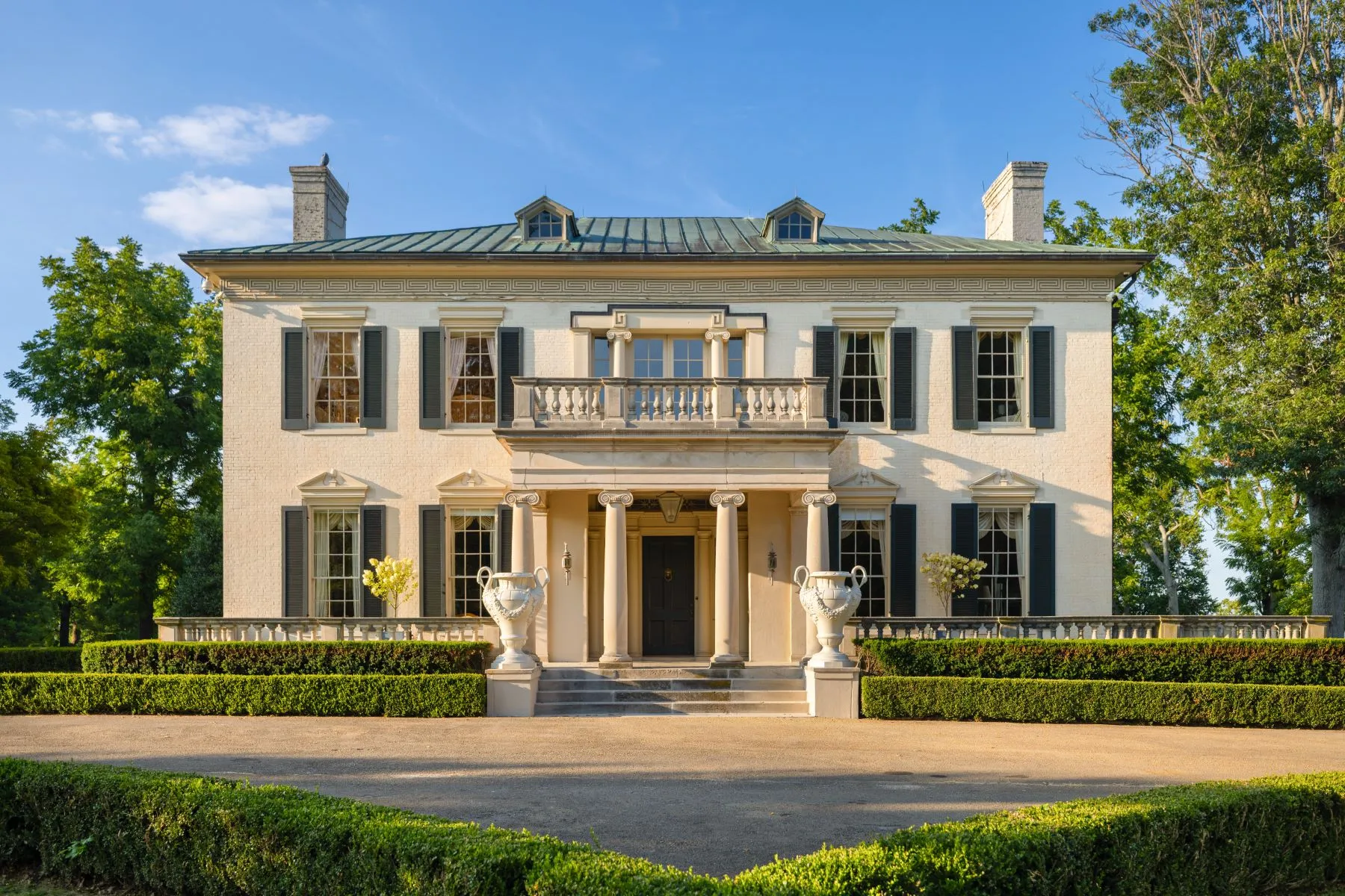 13,500-square-foot Greek Revival mansion.