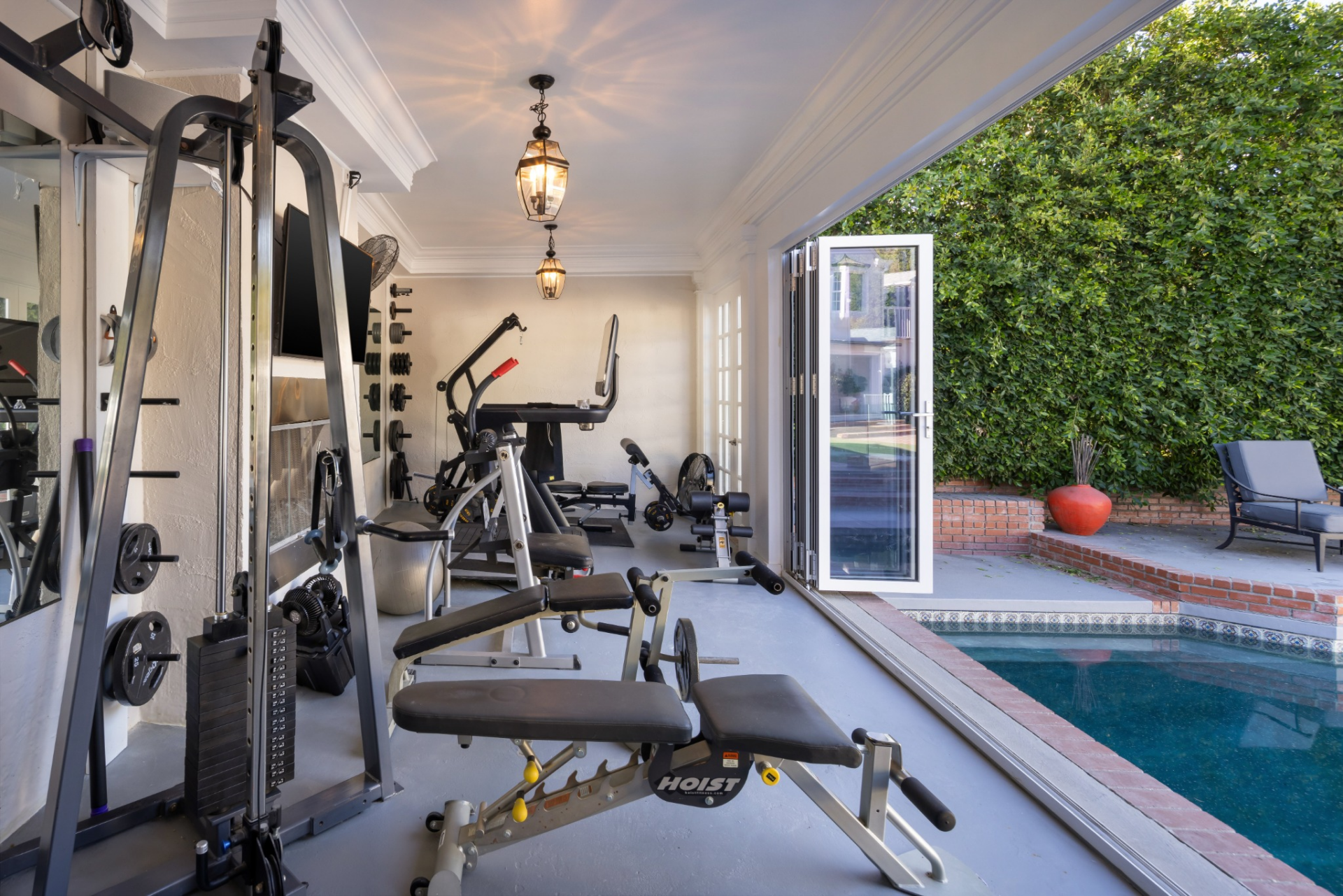 Another separate building has been converted into a full gym with weight-training equipment and cardio machines. 