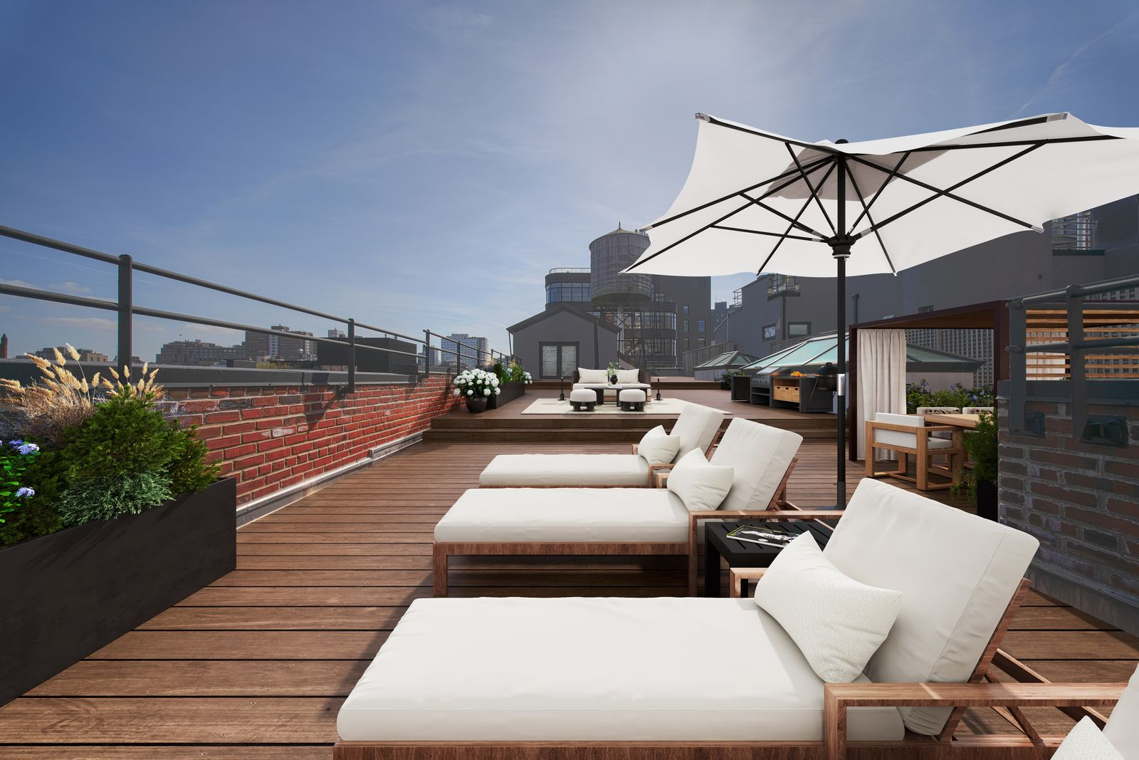 Wood decking moves between several lounge areas, with chaise seating arranged beneath umbrellas and a larger sitting area set a few steps higher at the center of the roof.