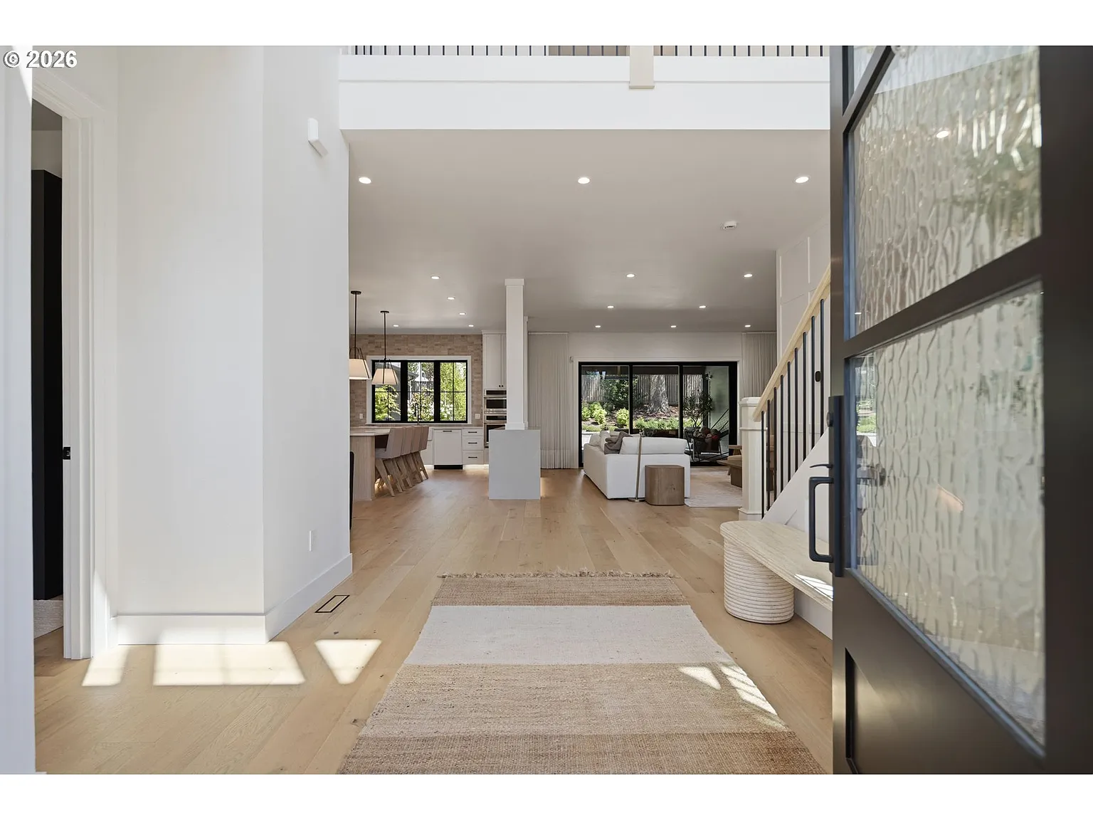 From the foyer, the floor plan opens directly into the main living spaces.