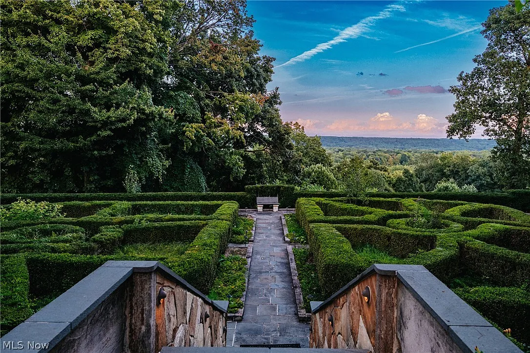 A geometric garden across the sloping grounds. 
