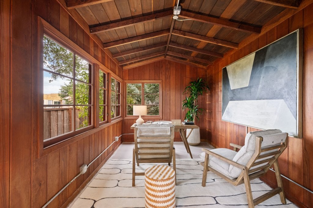 A small finished cabin has been converted into an office space.