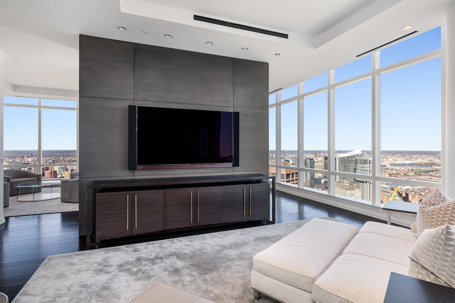 A smaller media area centered on a mounted television.