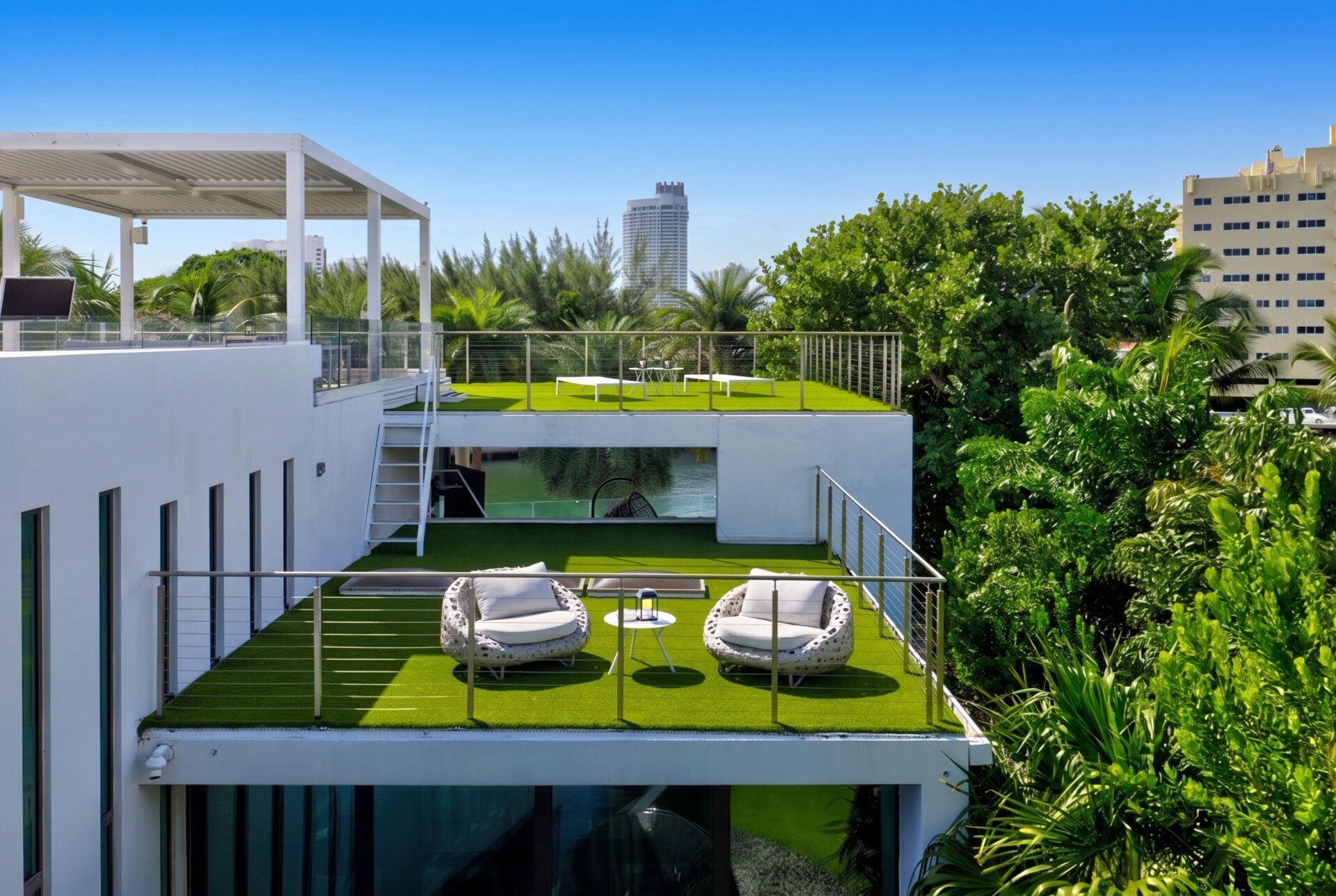 Smaller turf-covered lounge areas can be reached via a short ladder.
