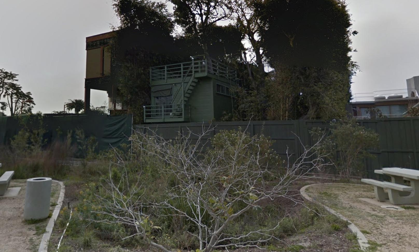 At the back of the property, a private gate opens onto the Malibu Lagoon trail.