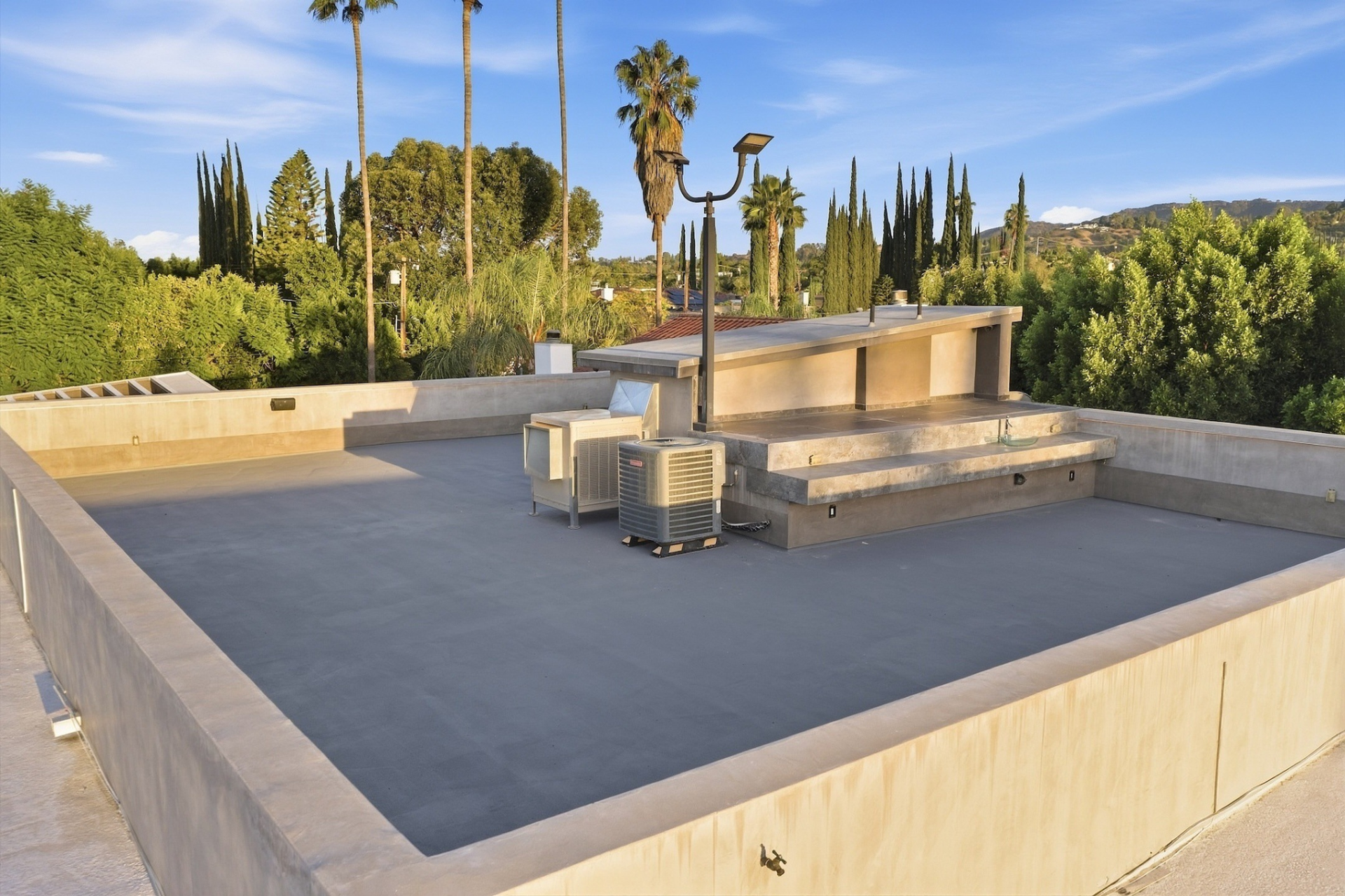 Above it all, a rooftop entertaining terrace sits at the top of the main house.