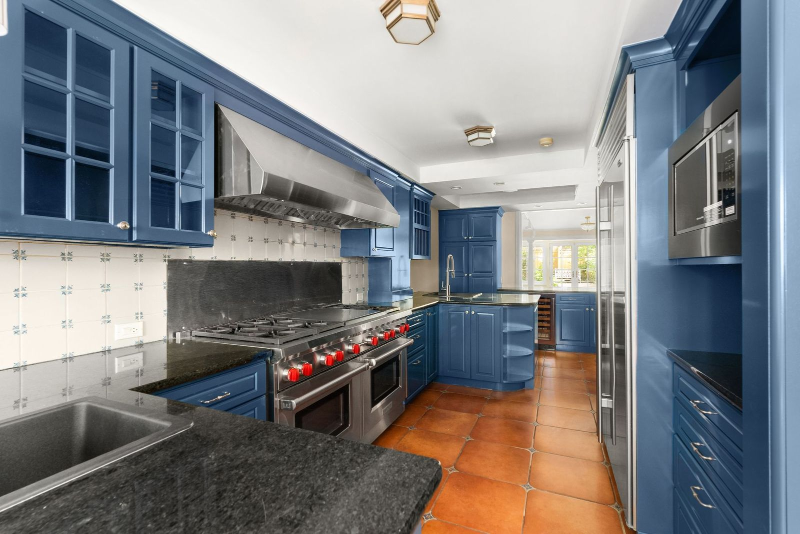 The eat-in kitchen takes up much of the garden level.